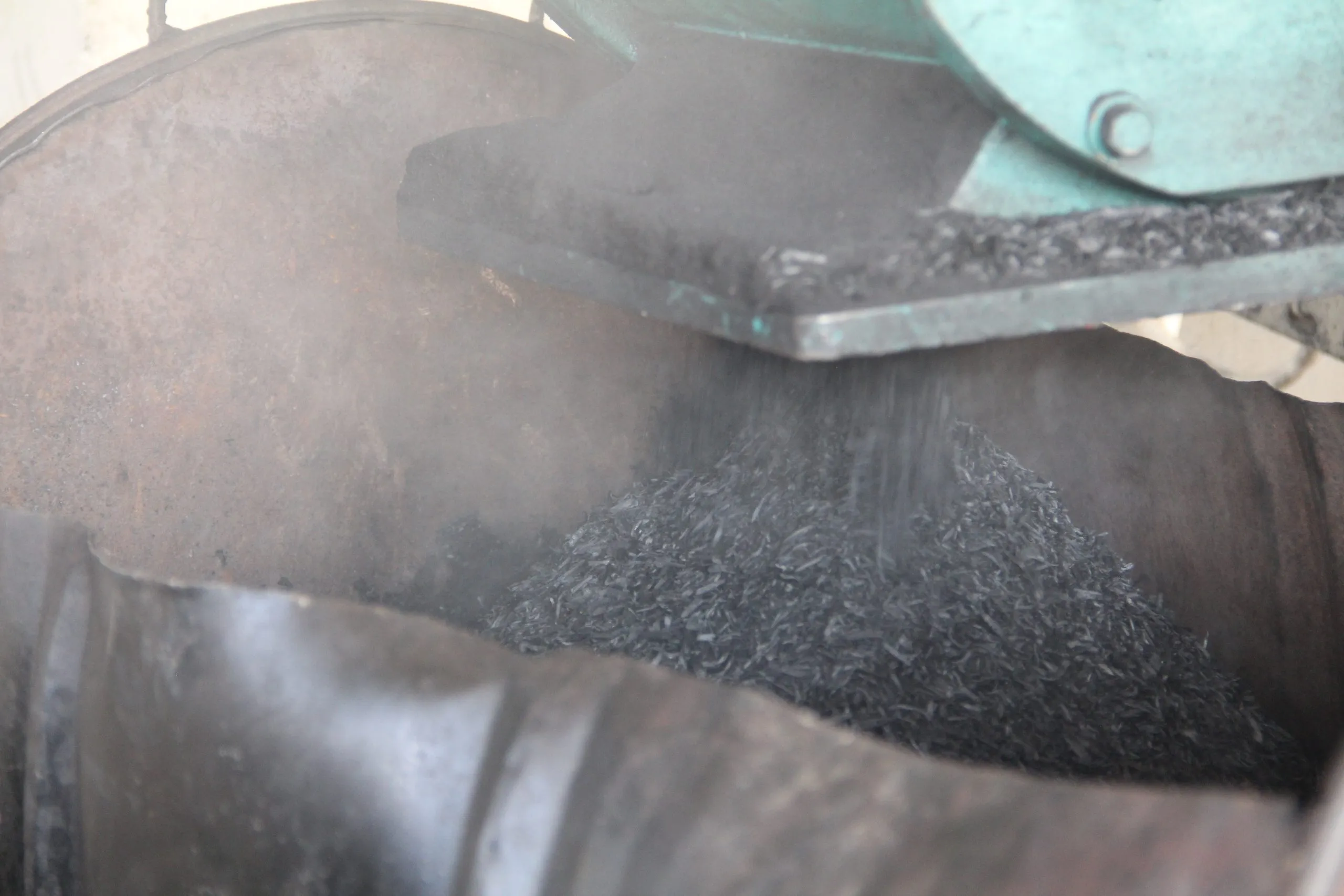 Hot char discharging from the reactor outlet